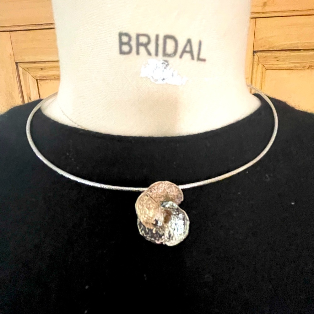 Sterling silver abstract flower. Necklace.  Designed by artist in Belgium